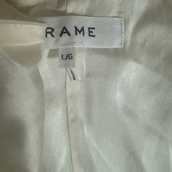 FRAME DENIM
SHIRRED FLOUNCE TOP - OFF WHITE
$369.00 size L - Picture 7 of 9